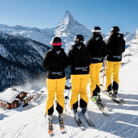 skiers and matterhorn